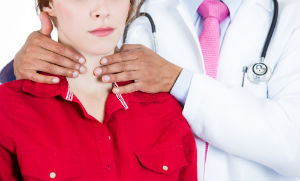 doctor-checking-thyroid-health