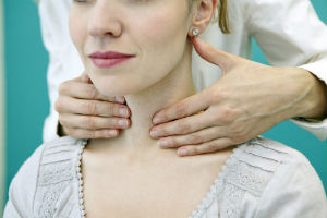 doctor-checking-female-thyroid