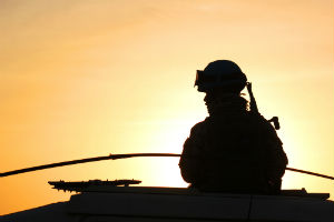 troop-silhouette-against-sky
