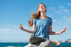 woman-outdoors-meditating