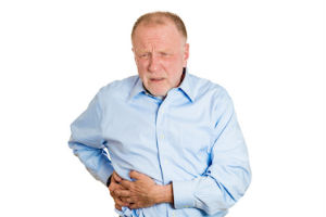 Man experiencing discomfort in his gallbladder
