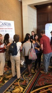 Dr. Edward Group meets with the audience members at the Truth About Cancer Symposium.
