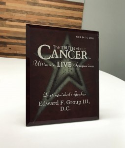 Dr. Edward Group received a Distinguished Presenter award at the Truth About Cancer Symposium.