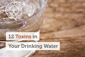 A glass of water sitting on a table. There can be many toxins in your drinking water that can
negatively impact your health.