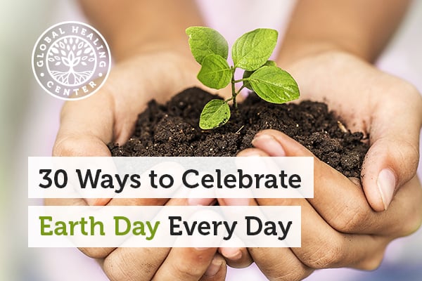 A person holding soil. Planting a tree is a simple way to support Earth Day.