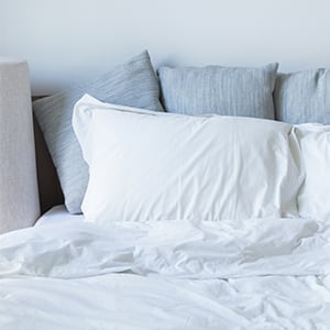 A messy bed. Sleep deprivation can lead to health issues.