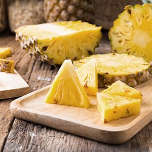 A plate of pineapple chunks. Pineapples are naturally rich in digestive enzymes.